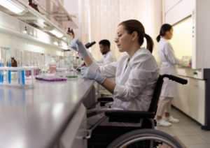 Lab worker in wheelchair performing tests